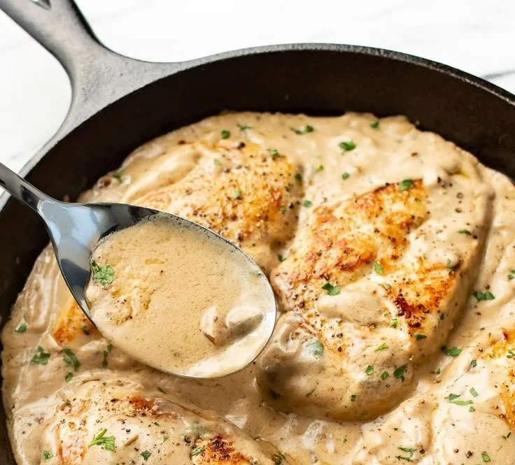 Cream of Mushroom Chicken served with green vegetables