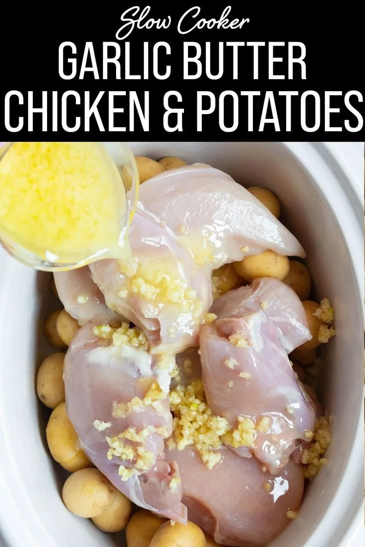 Slow Cooker Garlic Butter Chicken and Potatoes served on a plate